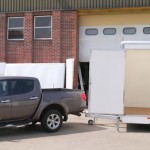 Megan Twin type approved light weight trailer towed by L200